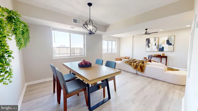 a kitchen with cabinets appliances and a sink