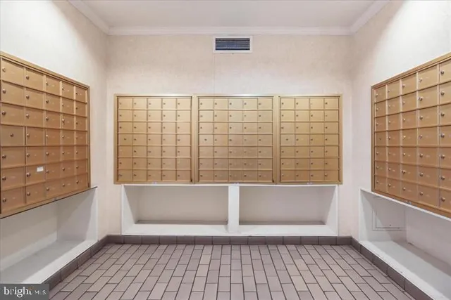 a bedroom with a bed and a night stand