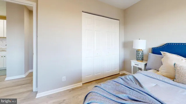 a couple of cars parked in front of a building