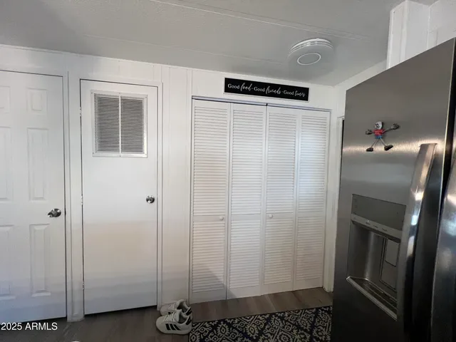 a bathroom with a shower and a sink