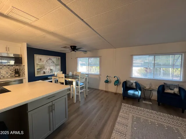 a room with lots of table and chairs