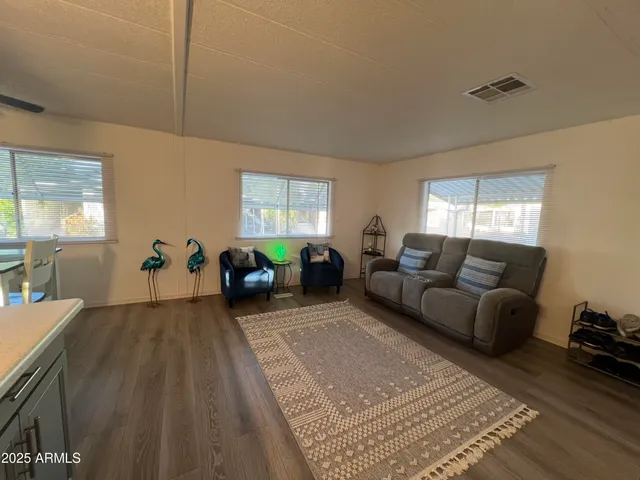 a living room with furniture and a couch