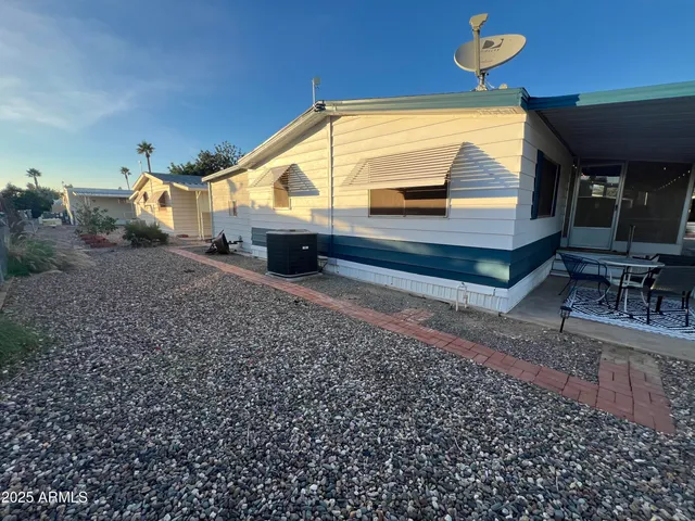 a view of a couches and table in the patio
