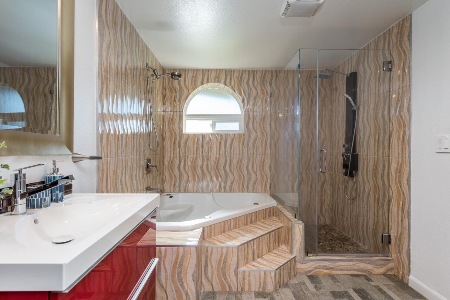 1040 Continentals Way, Unit 12 Belmont, CA 94002 - Photo 18 of 30 a bathroom with a sink and a mirror
