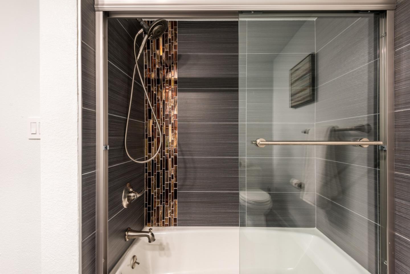 1040 Continentals Way, Unit 12 Belmont, CA 94002 - Photo 22 of 30 a bathroom with a shower