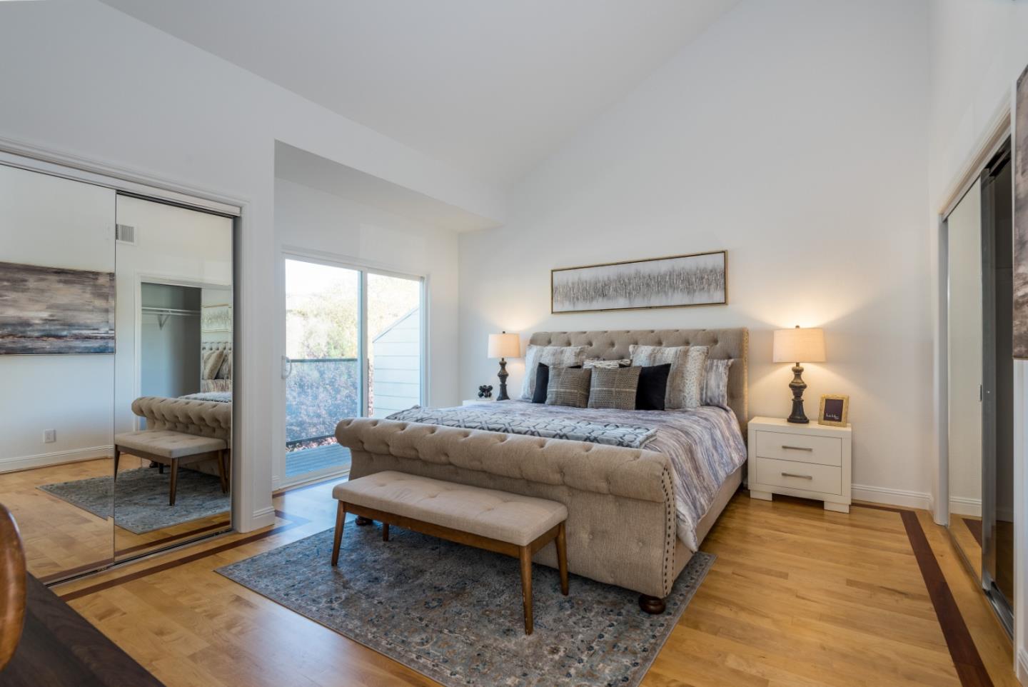 1040 Continentals Way, Unit 12 Belmont, CA 94002 - Photo 26 of 30 a bed room with a bed and a couch