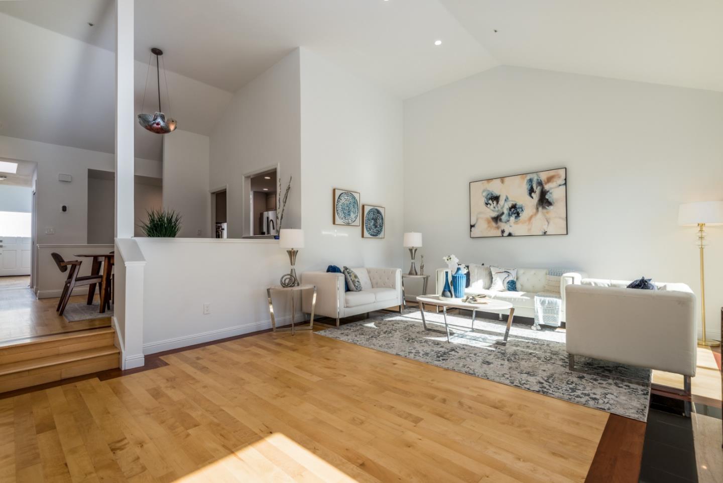 1040 Continentals Way, Unit 12 Belmont, CA 94002 - Photo 9 of 30 a living room with furniture