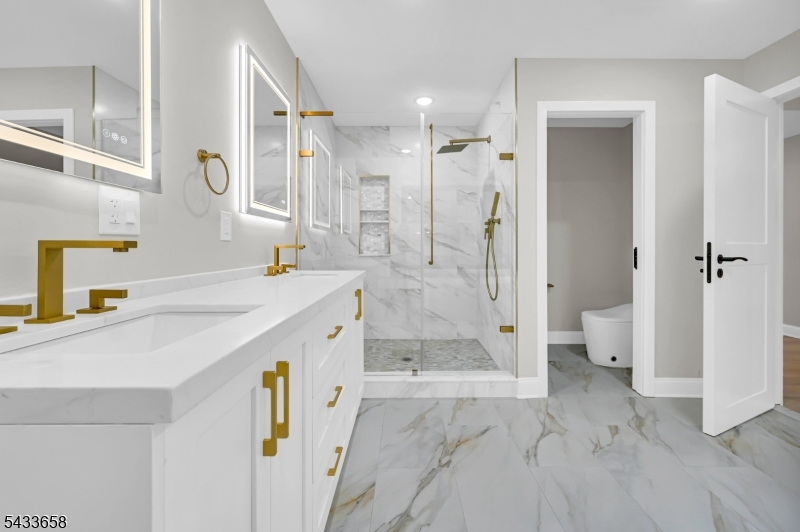 2 Orchard Road Florham Park, NJ 07932 - Photo 23 of 23 a bathroom with a sink a toilet and shower