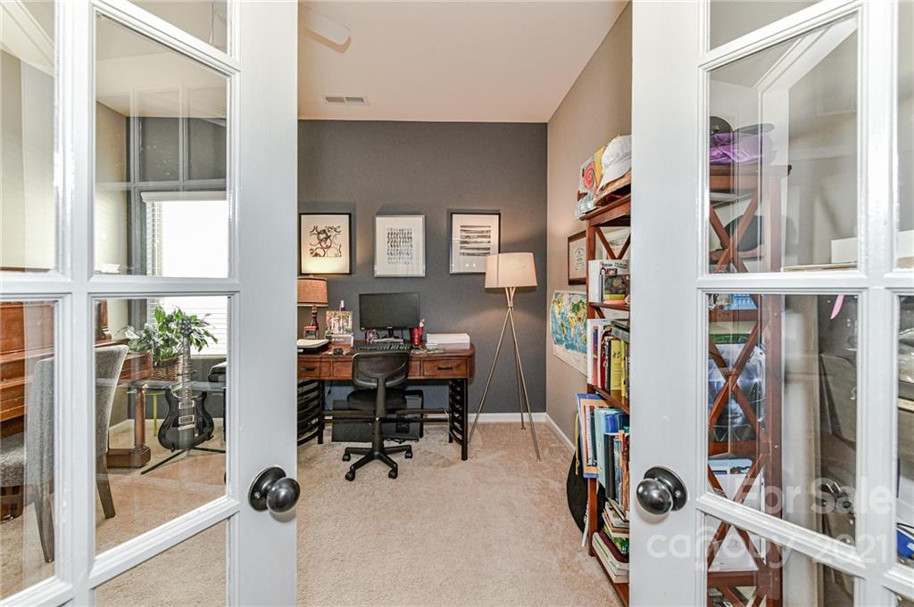 1532 Spring Blossom Trail Fort Mill, SC 29708 - Photo 6 of 28 a view of a livingroom with furniture and windows