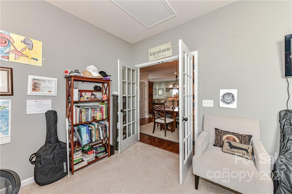 1532 Spring Blossom Trail Fort Mill, SC 29708 - Photo 8 of 28 a view of a livingroom with furniture and workspace