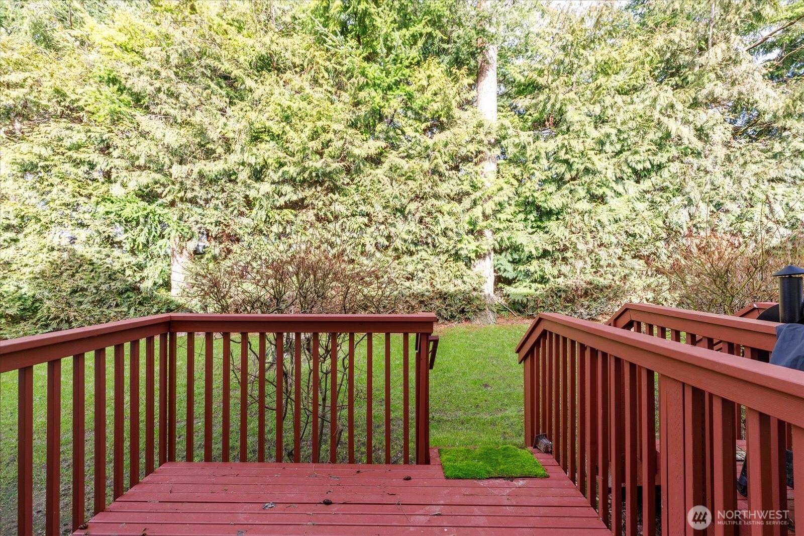 30875 State Rte 20, Unit M2 Oak Harbor, WA 98277 - Photo 13 of 29 a view of balcony with wooden floor and fence