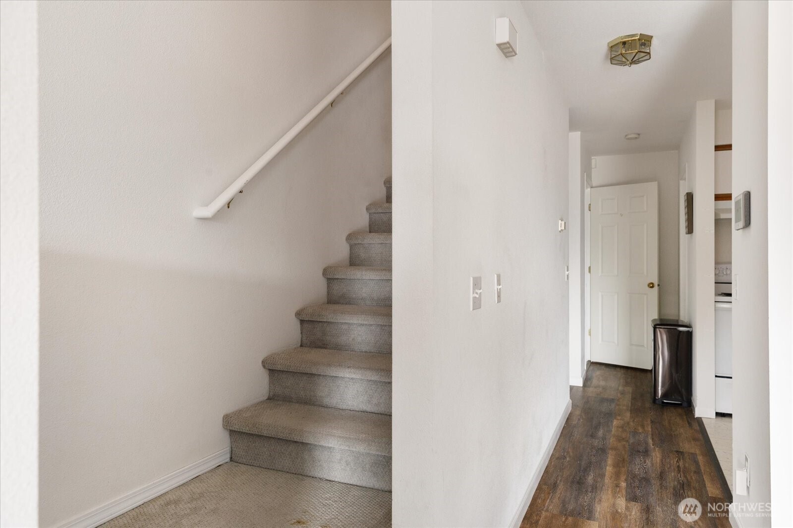 30875 State Rte 20, Unit M2 Oak Harbor, WA 98277 - Photo 16 of 29 a view of a hallway with wooden floor and entryway