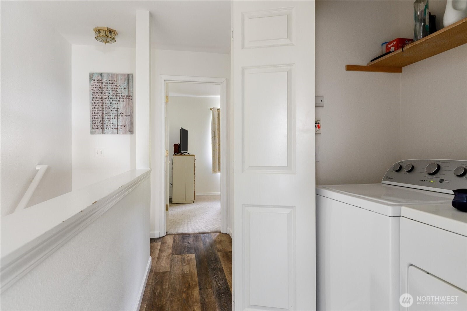 30875 State Rte 20, Unit M2 Oak Harbor, WA 98277 - Photo 24 of 29 a view of a hallway with closet and wooden floor