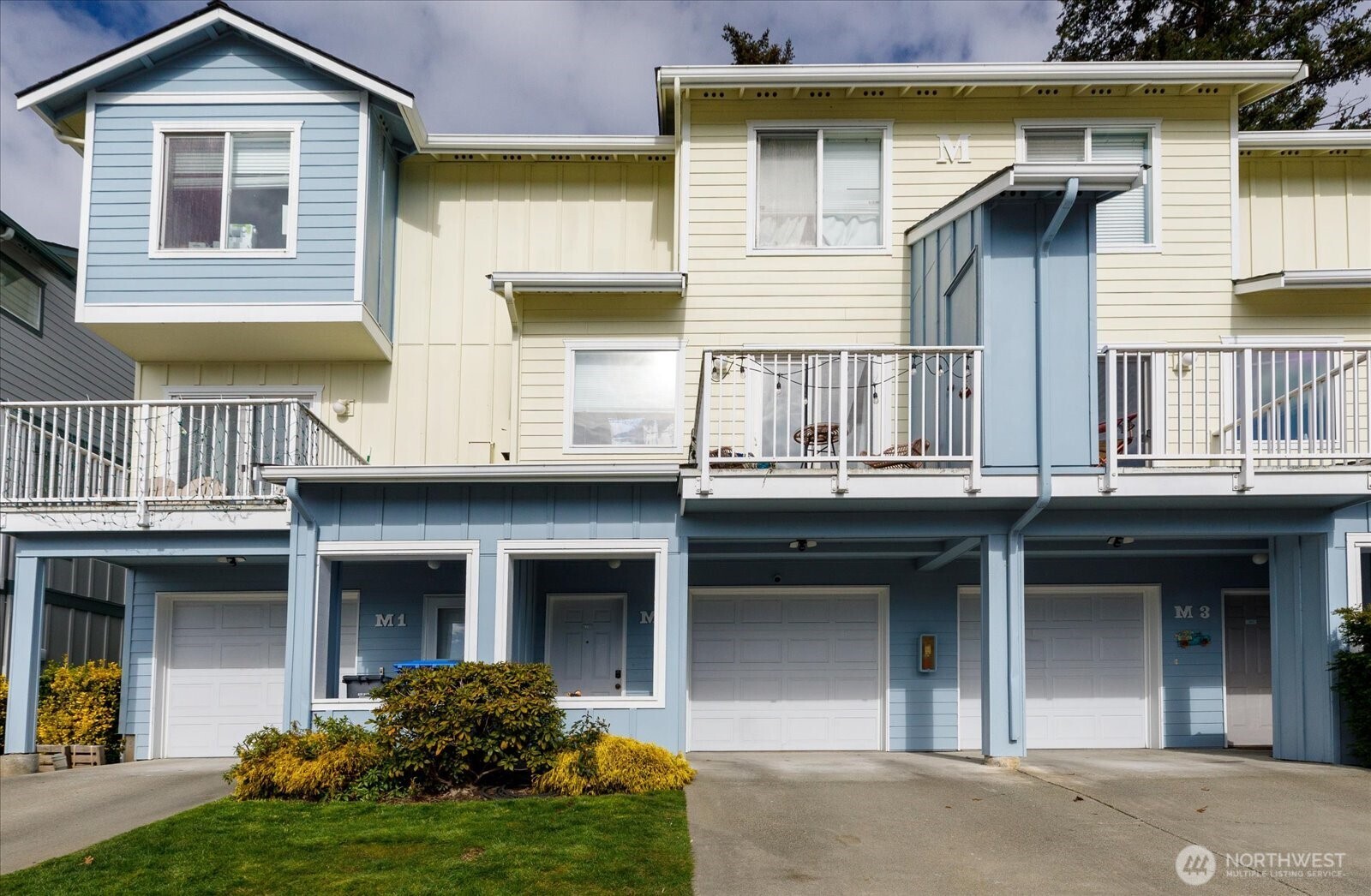30875 State Rte 20, Unit M2 Oak Harbor, WA 98277 - Photo 3 of 29 a view of a house with outdoor space
