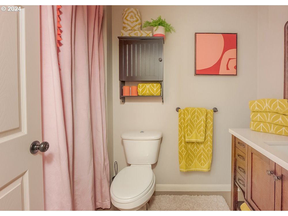 2097 Southwest Brixton Place Gresham, OR 97080 - Photo 19 of 43 a bathroom with a toilet and a sink