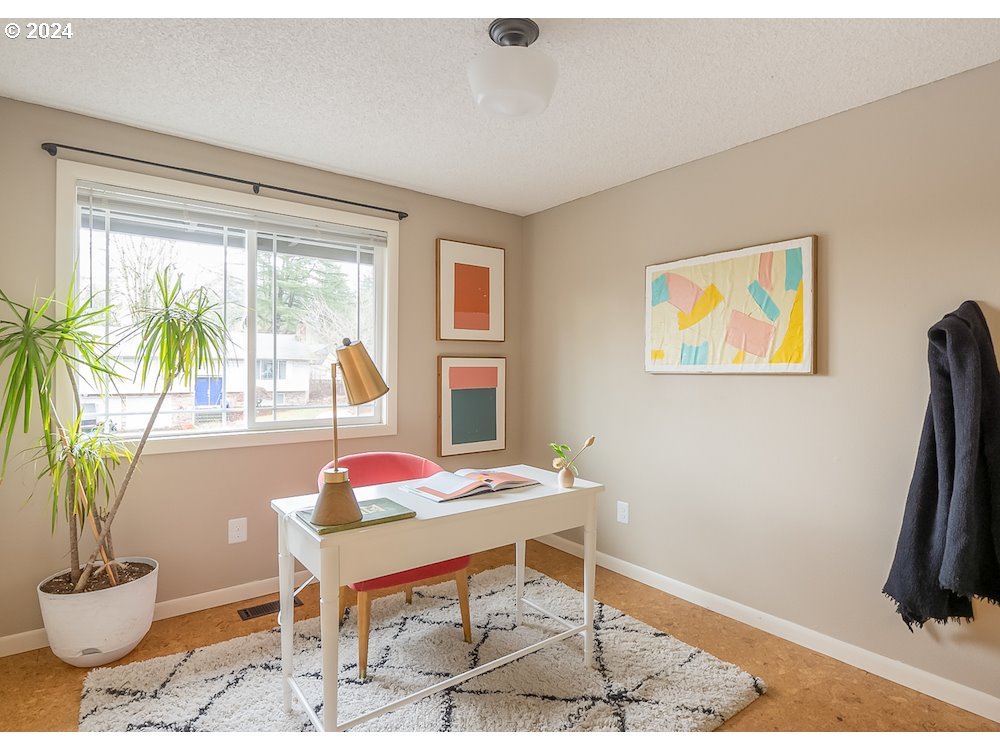 2097 Southwest Brixton Place Gresham, OR 97080 - Photo 22 of 43 a living room with furniture and a window
