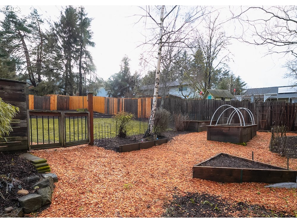 2097 Southwest Brixton Place Gresham, OR 97080 - Photo 40 of 43 a view of a backyard of the house