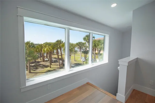 a view of a room that has a window in it