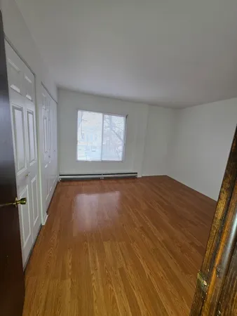 a living room with a rug