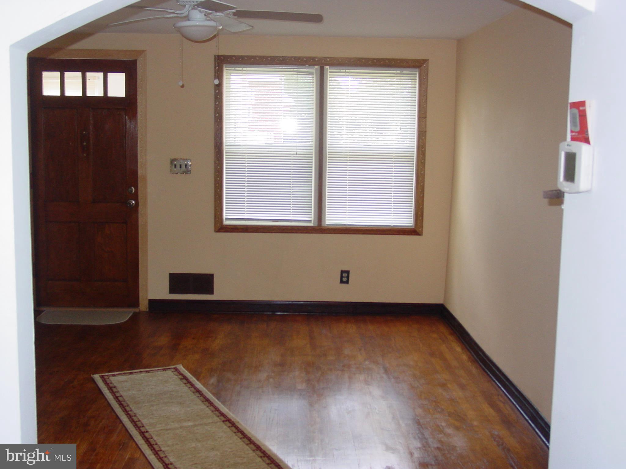 7406 Kirtley Road Baltimore, MD 21222 - Photo 20 of 21 an empty room with windows