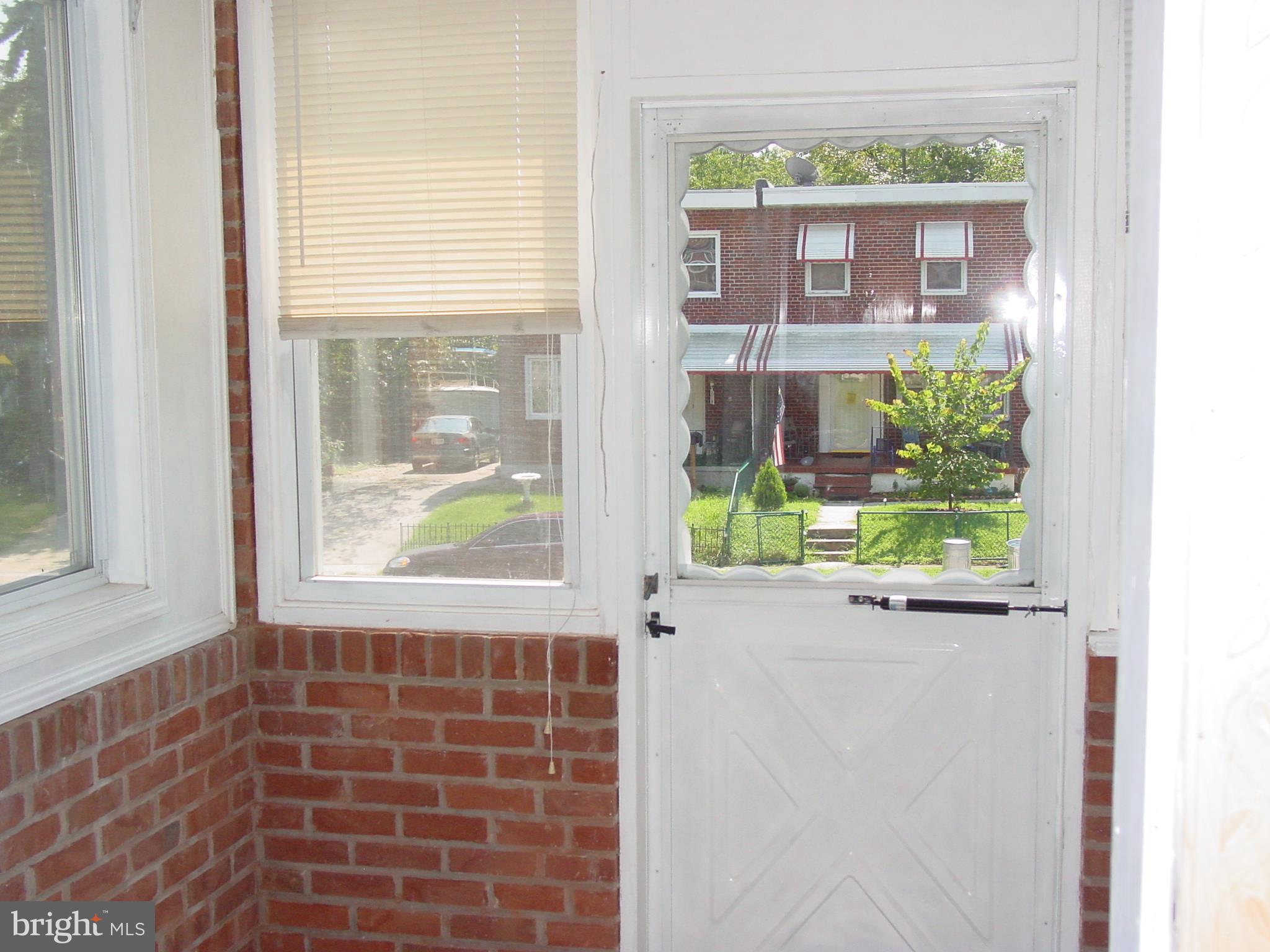 7406 Kirtley Road Baltimore, MD 21222 - Photo 5 of 21 a bathroom with a window