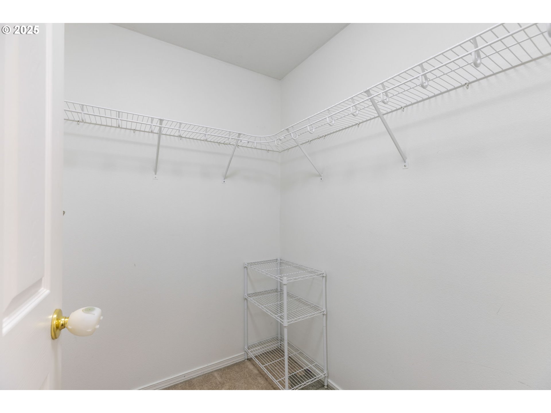 51692 Southeast 3rd Street Scappoose, OR 97056 - Photo 16 of 22 a view of a room with racks on the wall