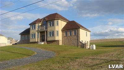 205 Gower Road Nazareth, PA 18064 - Photo 3 of 5 a front view of a house with a yard