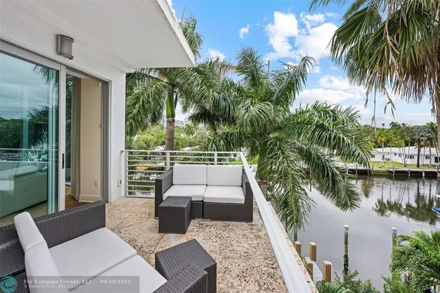 a view of swimming pool with a patio