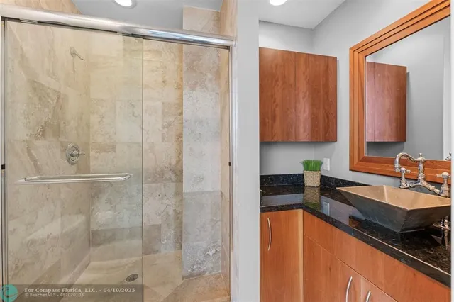 a view of a livingroom with furniture hardwood floor and a window