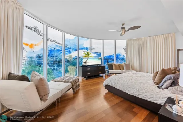 a bed room with a bed window and a couch