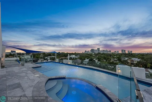 a view of a city with tall buildings