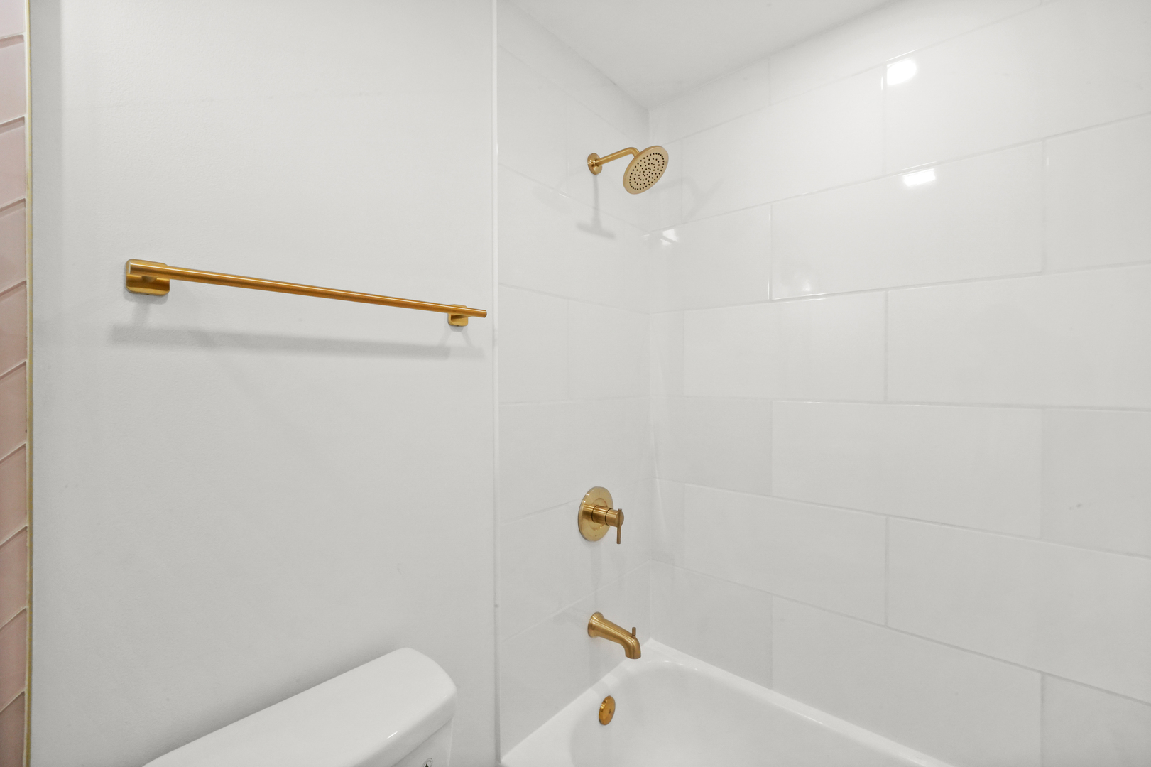 2101 West Rice Street, Unit 100 Chicago, IL 60622 - Photo 25 of 32 a bathroom with a shower and toilet