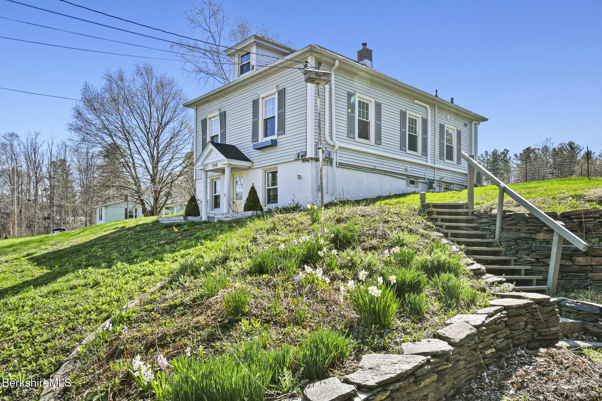 208 Jason Street Pittsfield, MA 01201 - Photo 2 of 32 a front view of a house with a yard