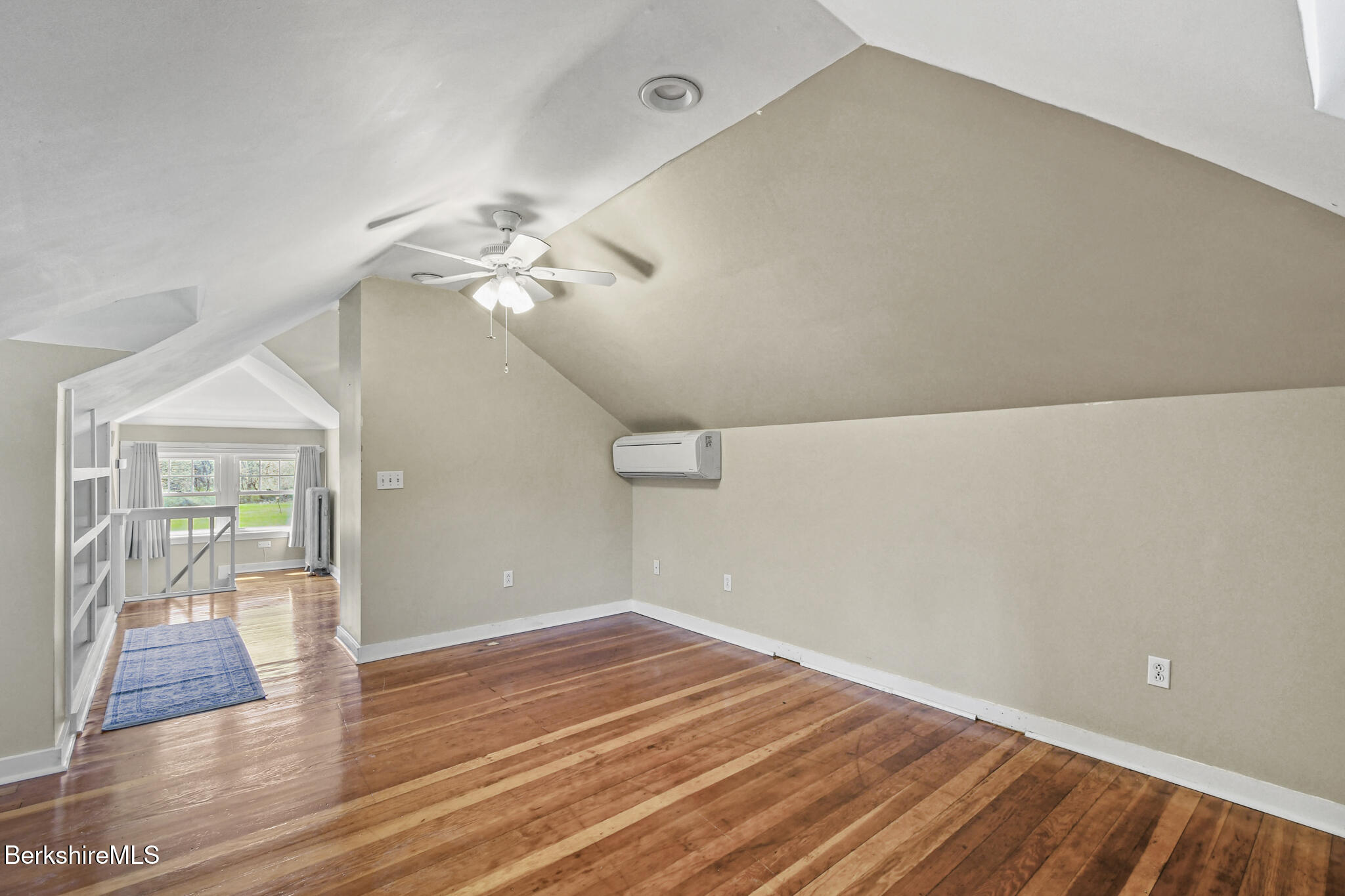 208 Jason Street Pittsfield, MA 01201 - Photo 21 of 32 wooden floor in an empty room with a window