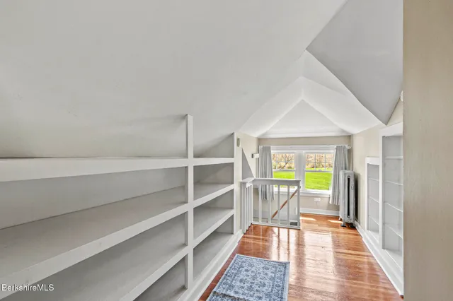 a workspace with furniture and window