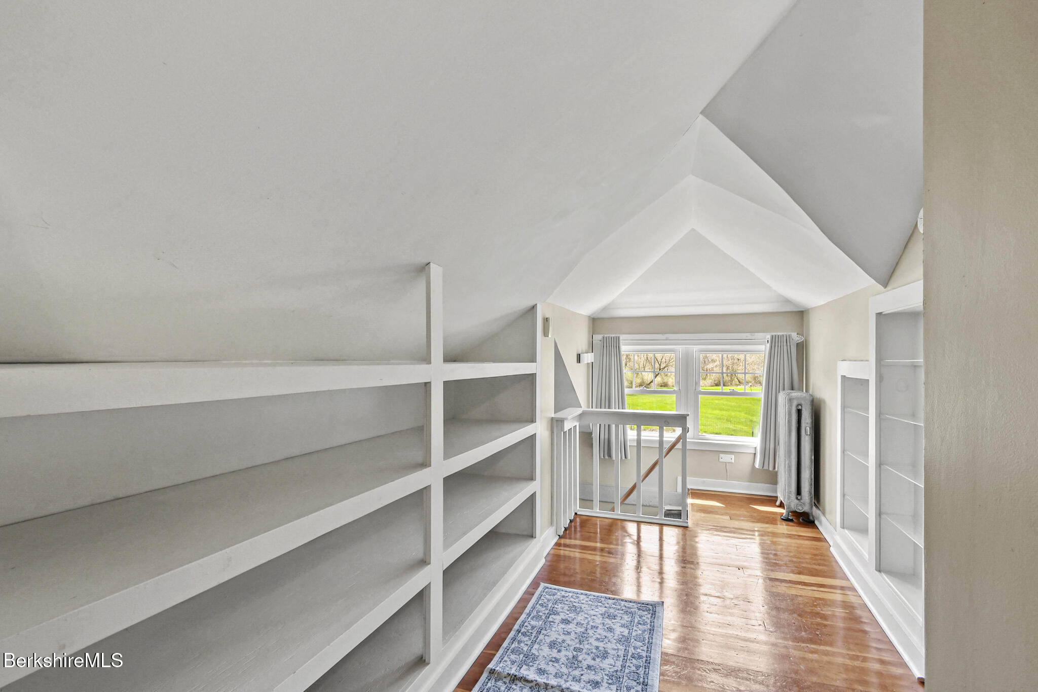 208 Jason Street Pittsfield, MA 01201 - Photo 22 of 32 a view of a room with shelves