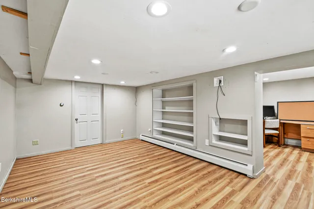 a bench sitting in the middle of a park