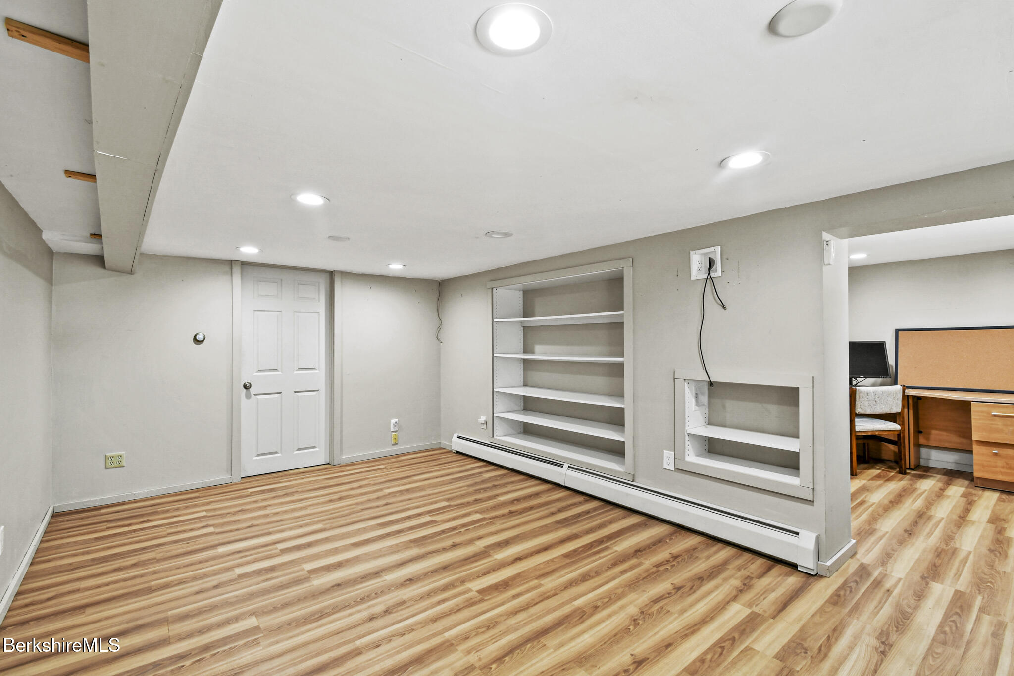 208 Jason Street Pittsfield, MA 01201 - Photo 26 of 32 a view of a room with wooden floor