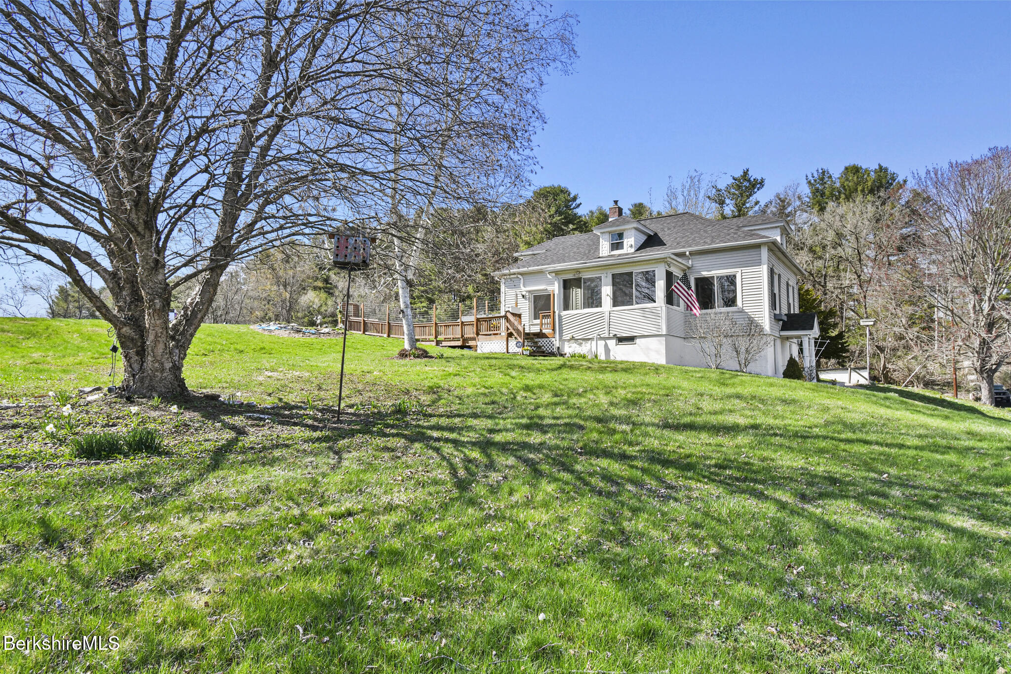 208 Jason Street Pittsfield, MA 01201 - Photo 27 of 32 a front view of a house with a yard