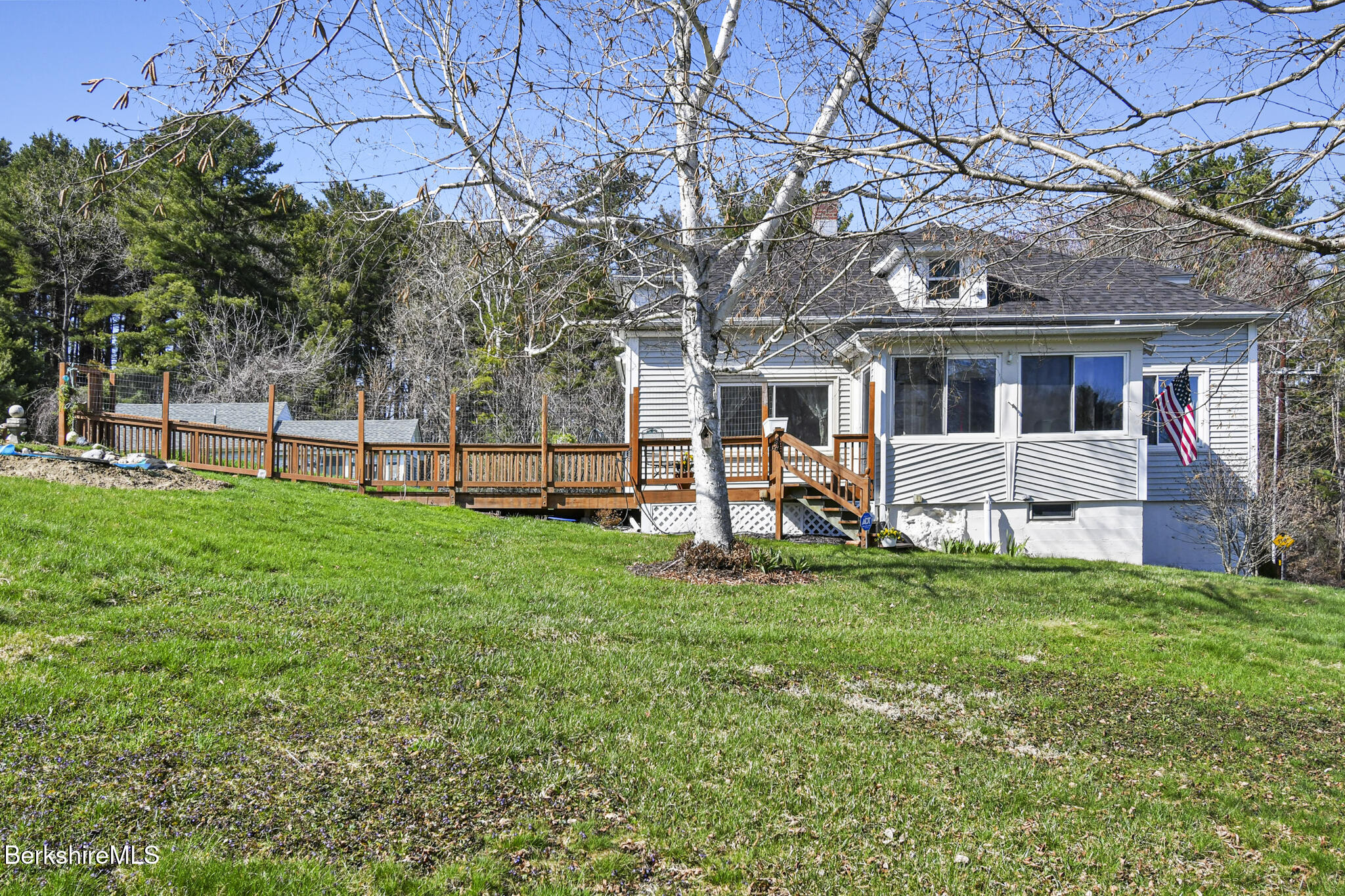 208 Jason Street Pittsfield, MA 01201 - Photo 5 of 32 a front view of house with yard with seating and green space