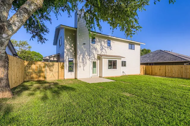 a house view with a garden space