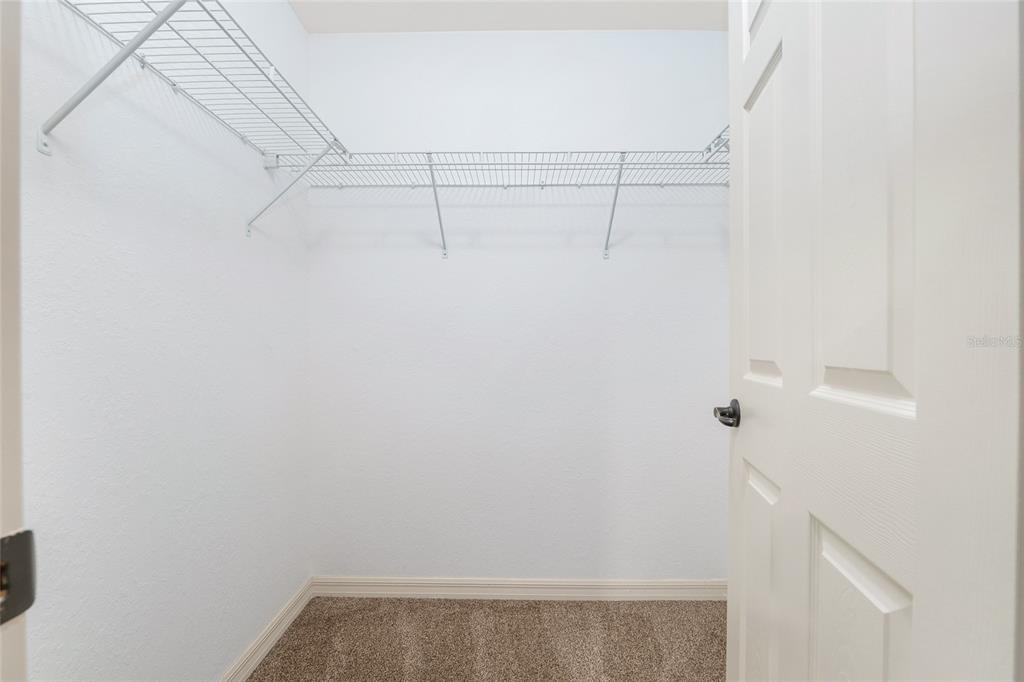 2 Hemlock Loop Drive Ocala, FL 34472 - Photo 19 of 28 a view of small space with racks on the wall