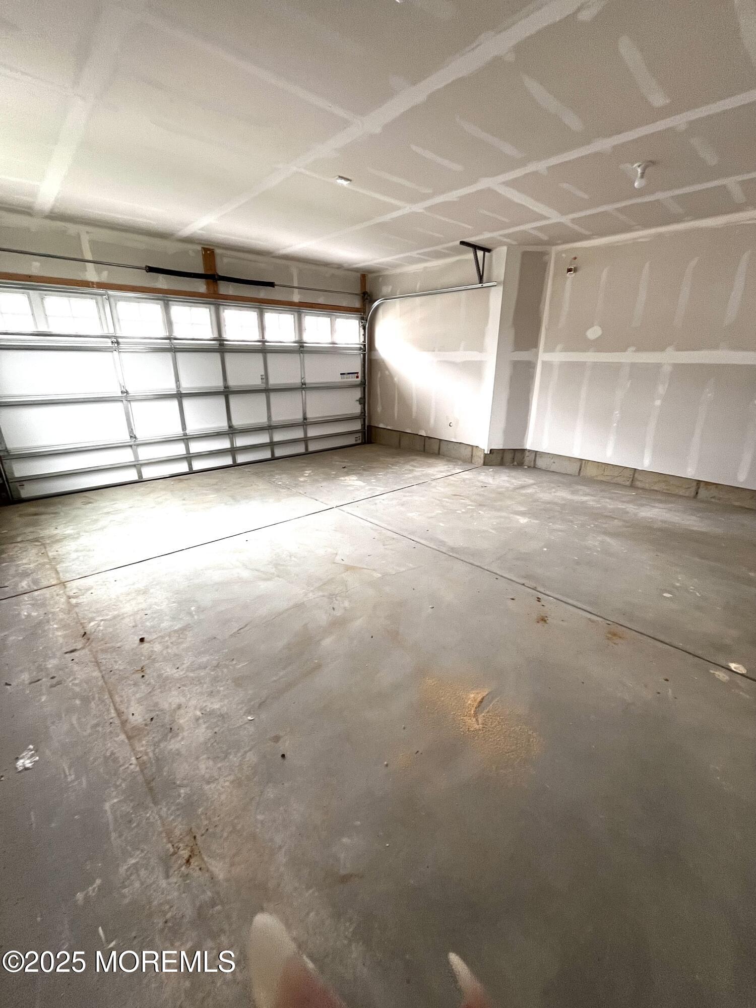 18 Rothbury Court Tinton Falls, NJ 07753 - Photo 22 of 27 a view of a garage