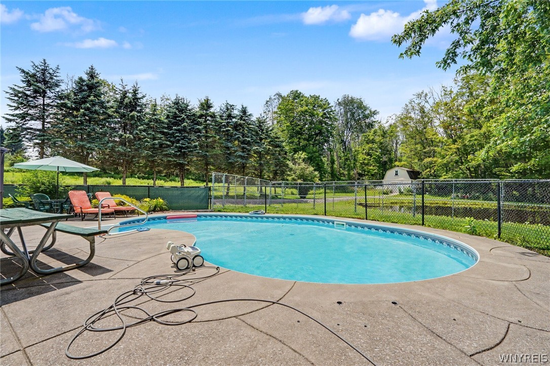 1738 Cheney Road Freedom, NY 14065 - Photo 16 of 47 Heated inground swimming pool