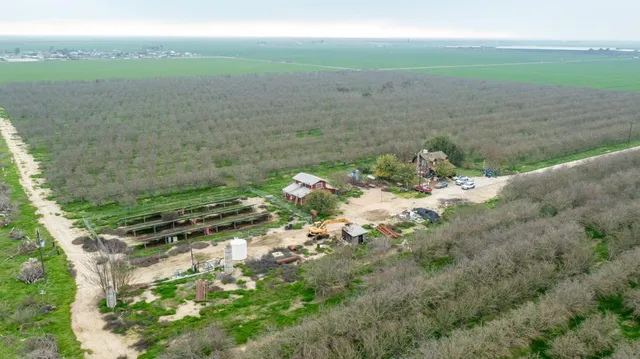a view of a lake with a yard