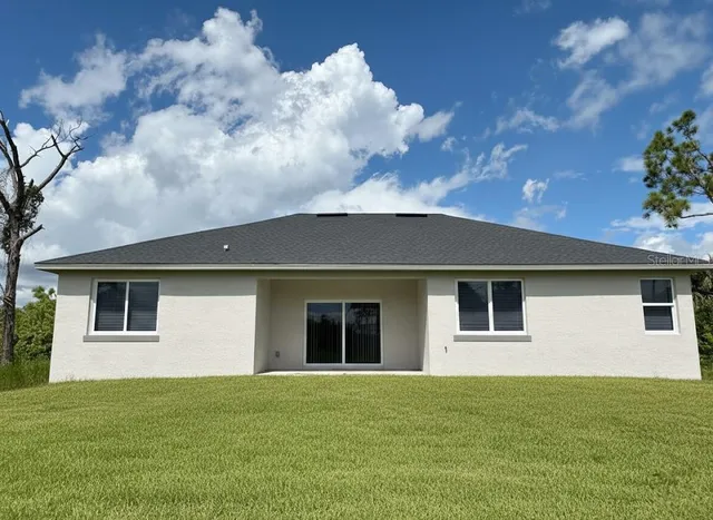 a house view with a garden space