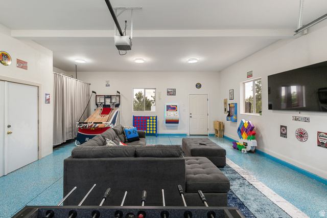755 South Zion Ridge Drive Orderville, UT 84758 - Photo 83 of 84 Living room featuring speckle patterned floor and a garage