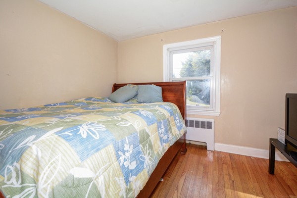 36 Concord Road Chelmsford, MA 01824 - Photo 15 of 27 a bedroom with a bed and a window
