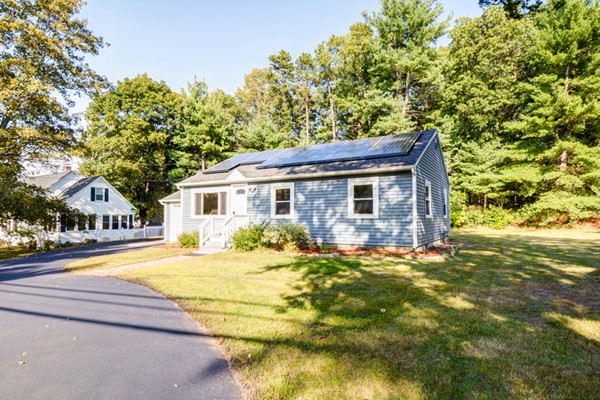 36 Concord Road Chelmsford, MA 01824 - Photo 2 of 27 a front view of a house with a garden