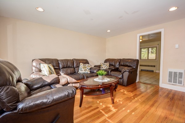 36 Concord Road Chelmsford, MA 01824 - Photo 5 of 27 a living room with furniture a rug and a window